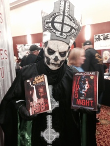 An insanely good Papa Emeritus cosplayer blesses my books. For Satan.
